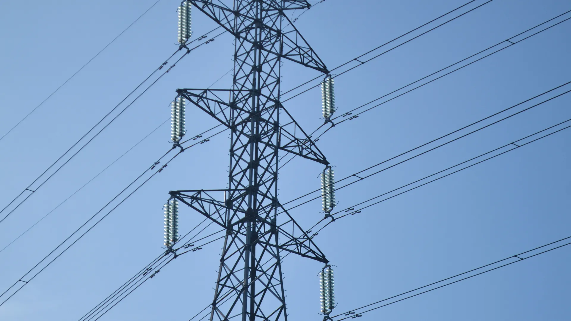 A high-voltage transmission tower and its lines